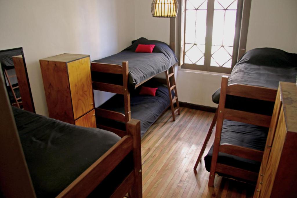 Postel nebo postele na pokoji v ubytování Hostal Irreal