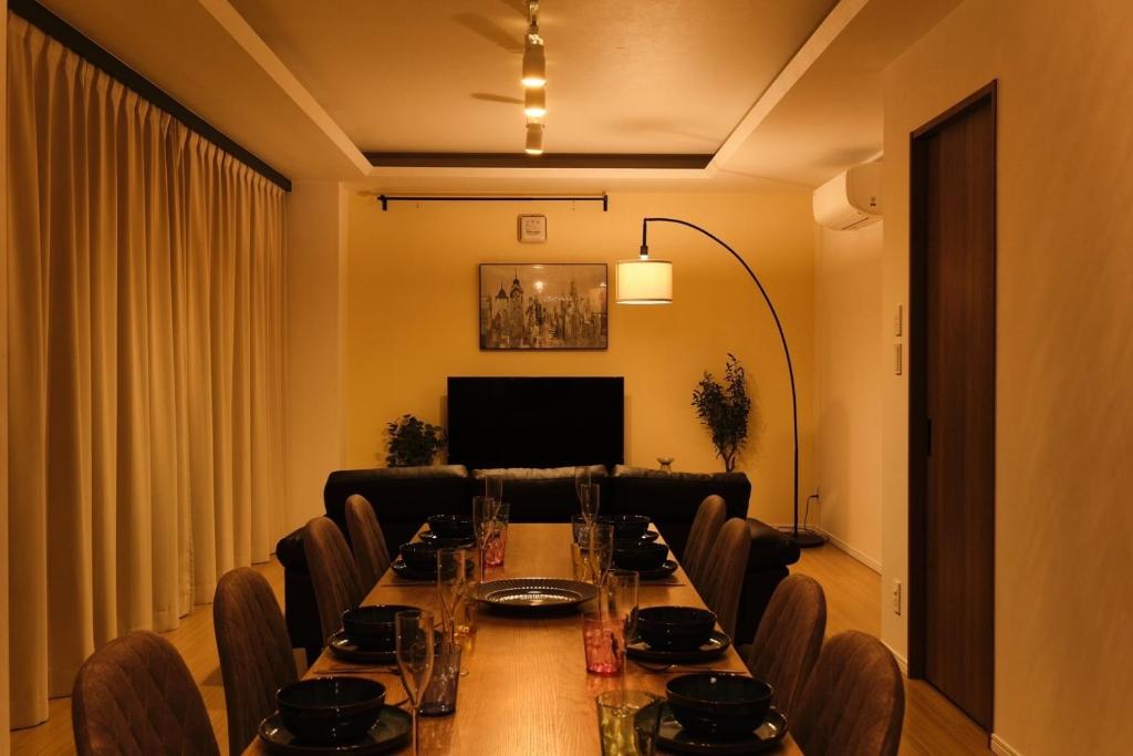 a dining room with a long table and chairs at Kiyosumi SOHO4B, 5th floor, 6th floor - Vacation STAY 20622v in Tokyo