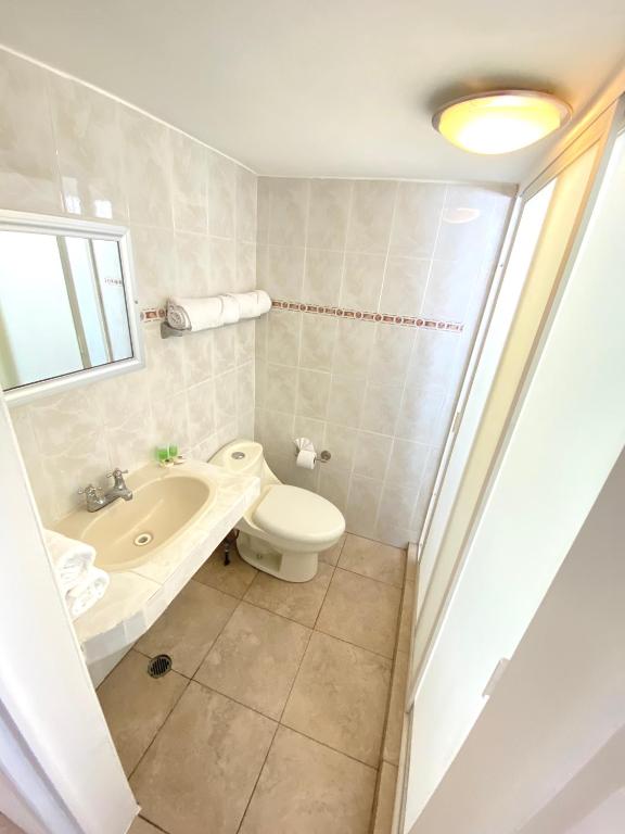 Hotel Qualitel Plus - 2 Dubbele Beddenkamer