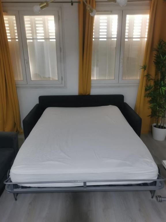 Posteľ alebo postele v izbe v ubytovaní Superbe appartement Montpellier 8 personnes 2 chambres 2 salles de bain Wifi Netflix et parking gratuit