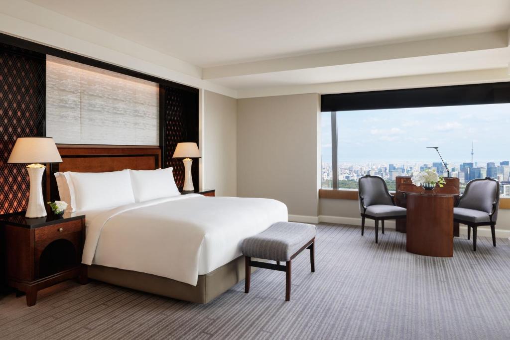 Postel nebo postele na pokoji v ubytování The Ritz-Carlton, Tokyo