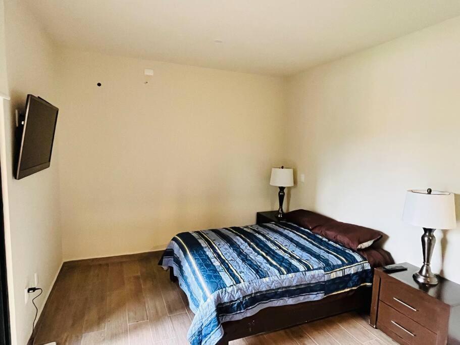 Een bed of bedden in een kamer bij Departamento Quinta