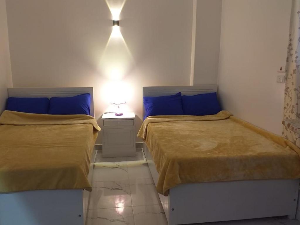 Ένα ή περισσότερα κρεβάτια σε δωμάτιο στο Elreda flats