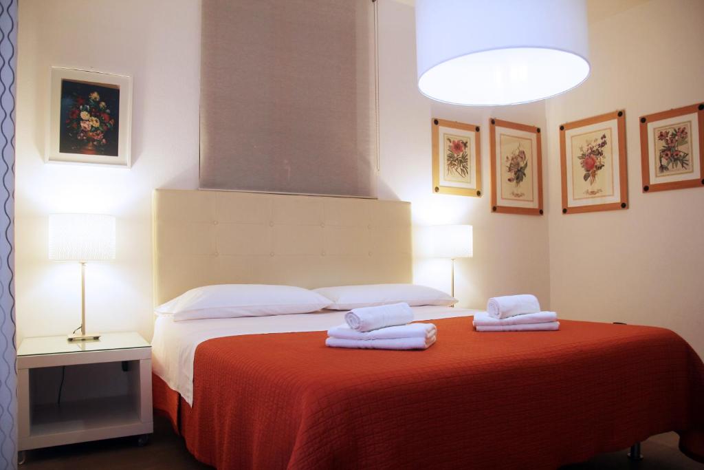 Łóżko lub łóżka w pokoju w obiekcie B&B Magnolia