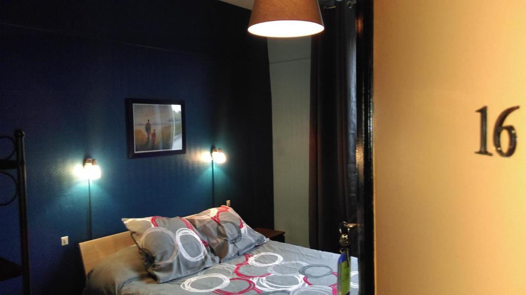 Postel nebo postele na pokoji v ubytování Hotel le Rallye
