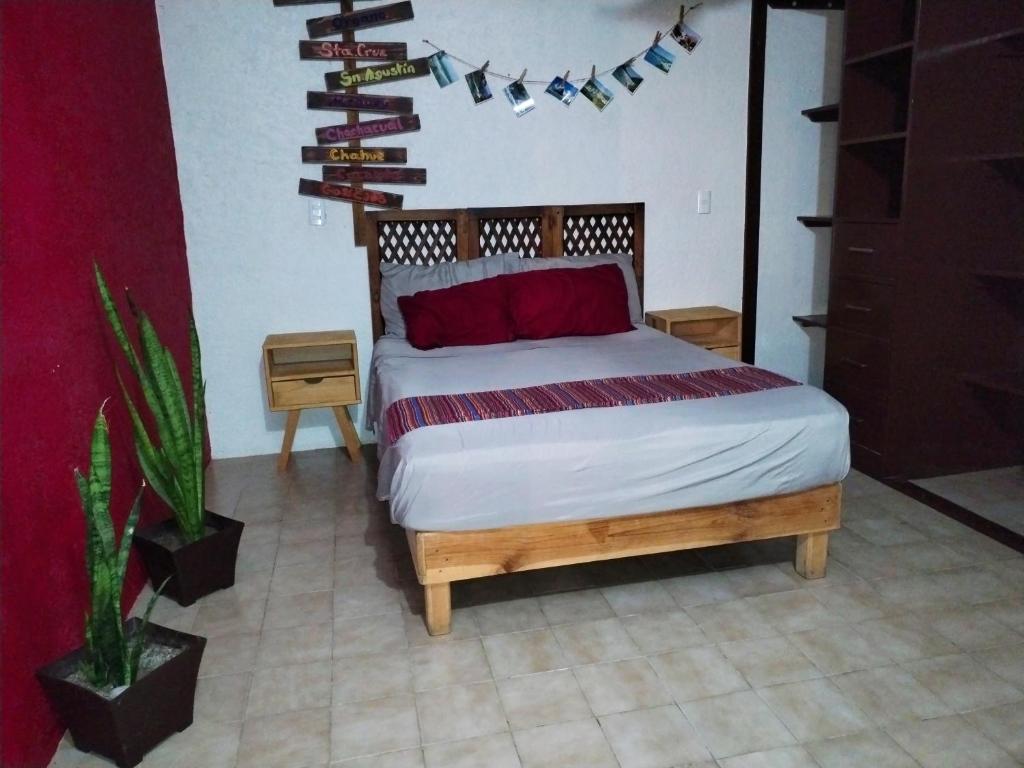 Postel nebo postele na pokoji v ubytování Aroma a Cafe