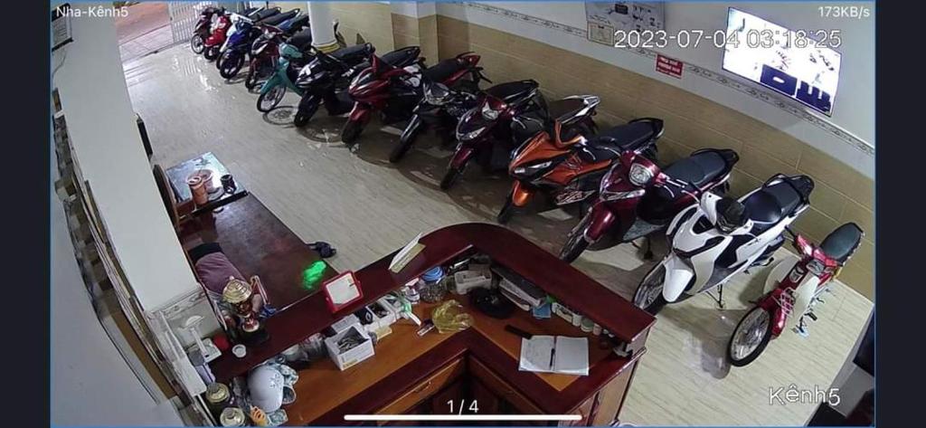 a group of motorcycles parked in a room at Nhà nghỉ phương nam in Ấp Rạch Mẹo
