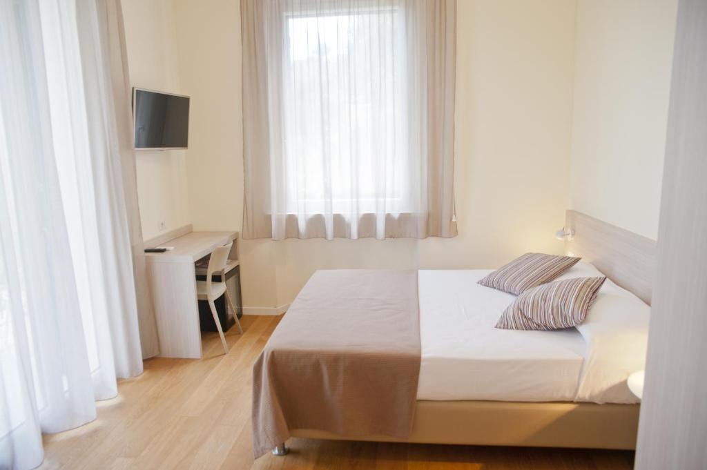 Postel nebo postele na pokoji v ubytování B&B Via delle 5 Terre