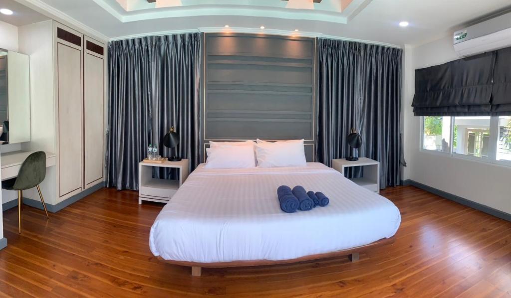 Postel nebo postele na pokoji v ubytování I am pool villa Pattaya no 5