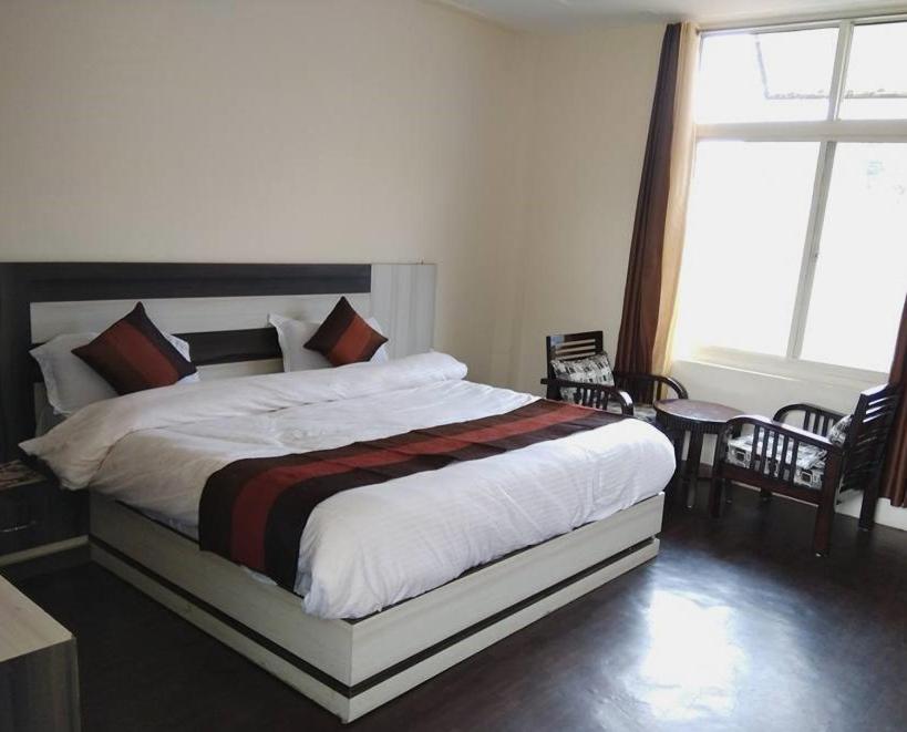 Posteľ alebo postele v izbe v ubytovaní Aromo's S N Resort