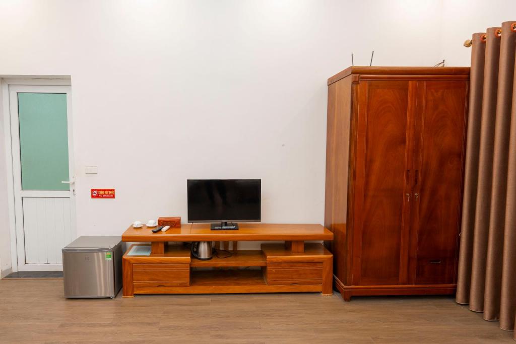 TV a/nebo společenská místnost v ubytování Biển Đông COMPLEX