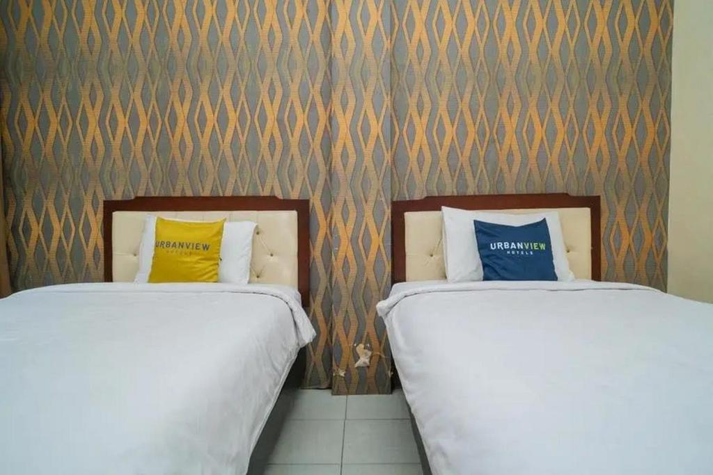Urbanview Hotel Omah Anin Batu by RedDoorz - 双室