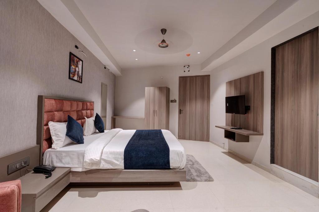 Postel nebo postele na pokoji v ubytování Hotel Sparsh Divine
