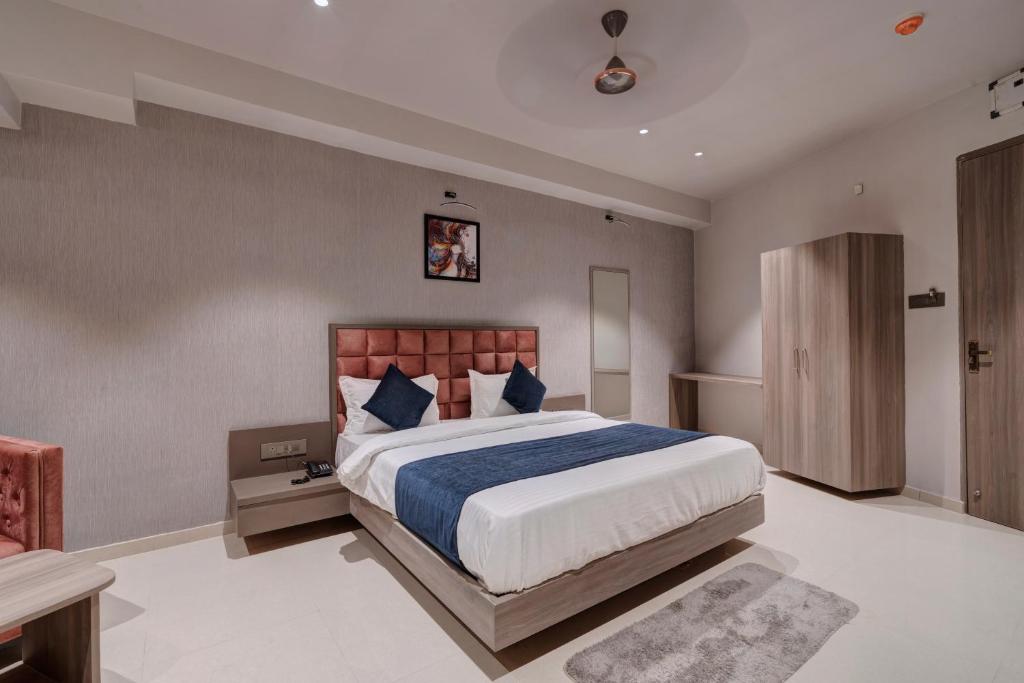 Postel nebo postele na pokoji v ubytování Hotel Sparsh Divine