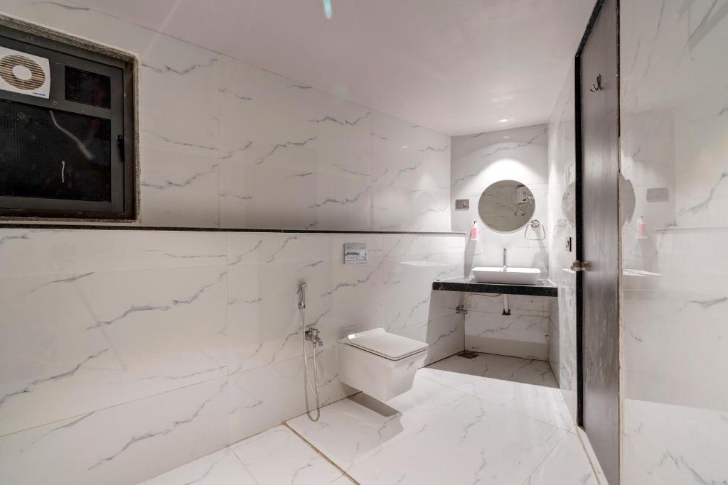 Koupelna v ubytování Hotel Sparsh Divine