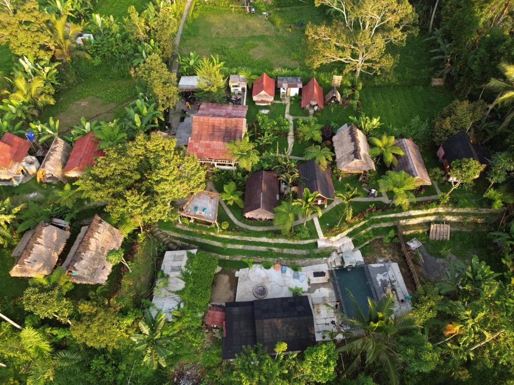 an aerial view of a model house with trees at Tetebatu Sama Sama Bungalows in Tetebatu