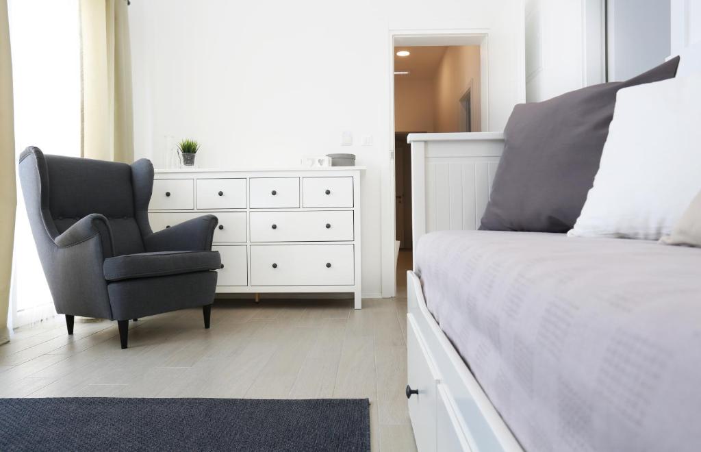 Postel nebo postele na pokoji v ubytování Boutique Hotel Alegria