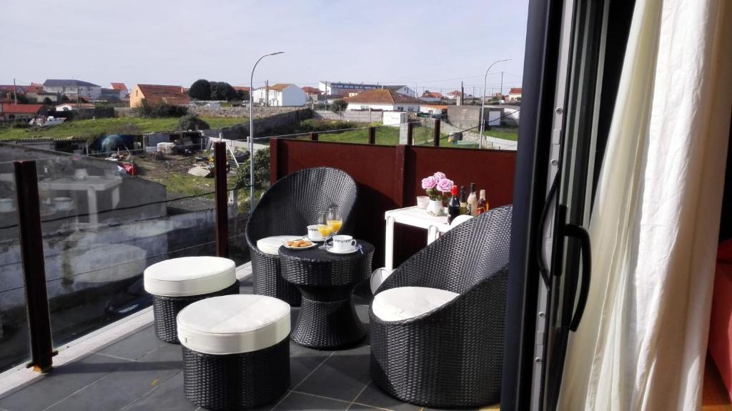 A balcony or terrace at duplex de lujo en medio del paraiso