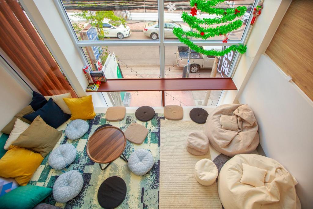 an overhead view of a living room with a couch at Lafami Hostel in Ban Nongdouang