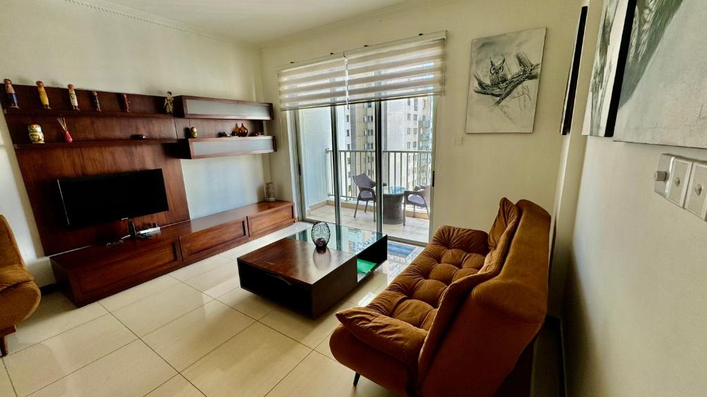TV a/nebo společenská místnost v ubytování SkyLounge Apartment Colombo
