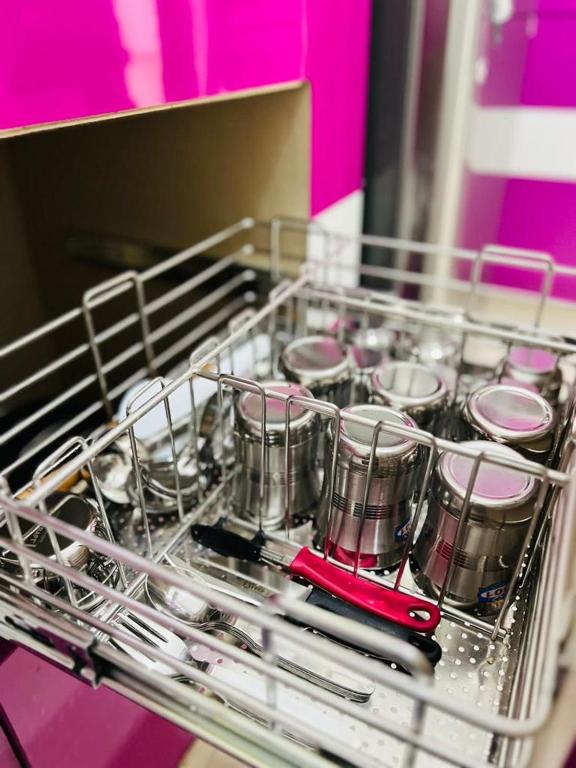 Kuchyň nebo kuchyňský kout v ubytování Abode Stayz Service Apartments