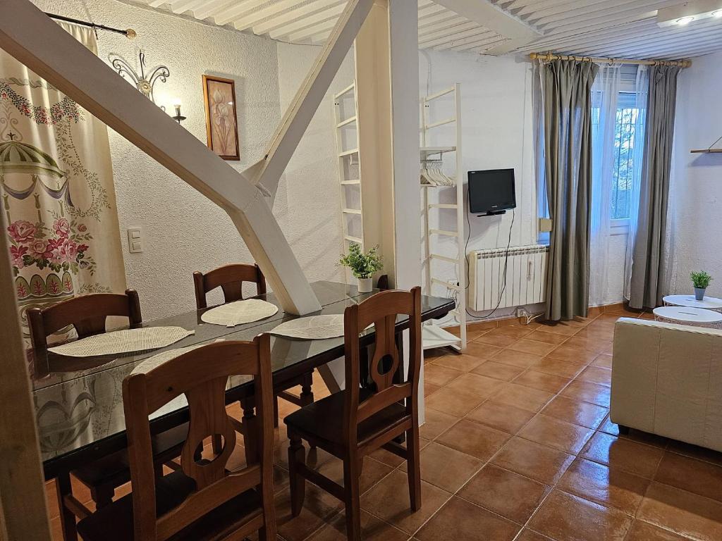Televízia a/alebo spoločenská miestnosť v ubytovaní IMEDA apartamentos EUROPA SIERRA NEVADA
