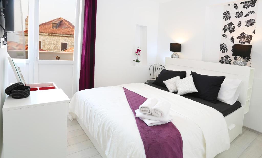 Postel nebo postele na pokoji v ubytování Boutique Hotel Alegria