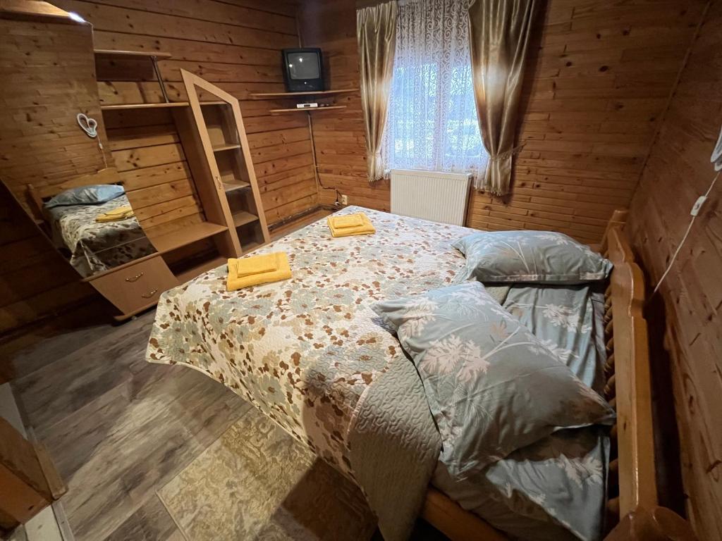 Postel nebo postele na pokoji v ubytování Sadyba Dana