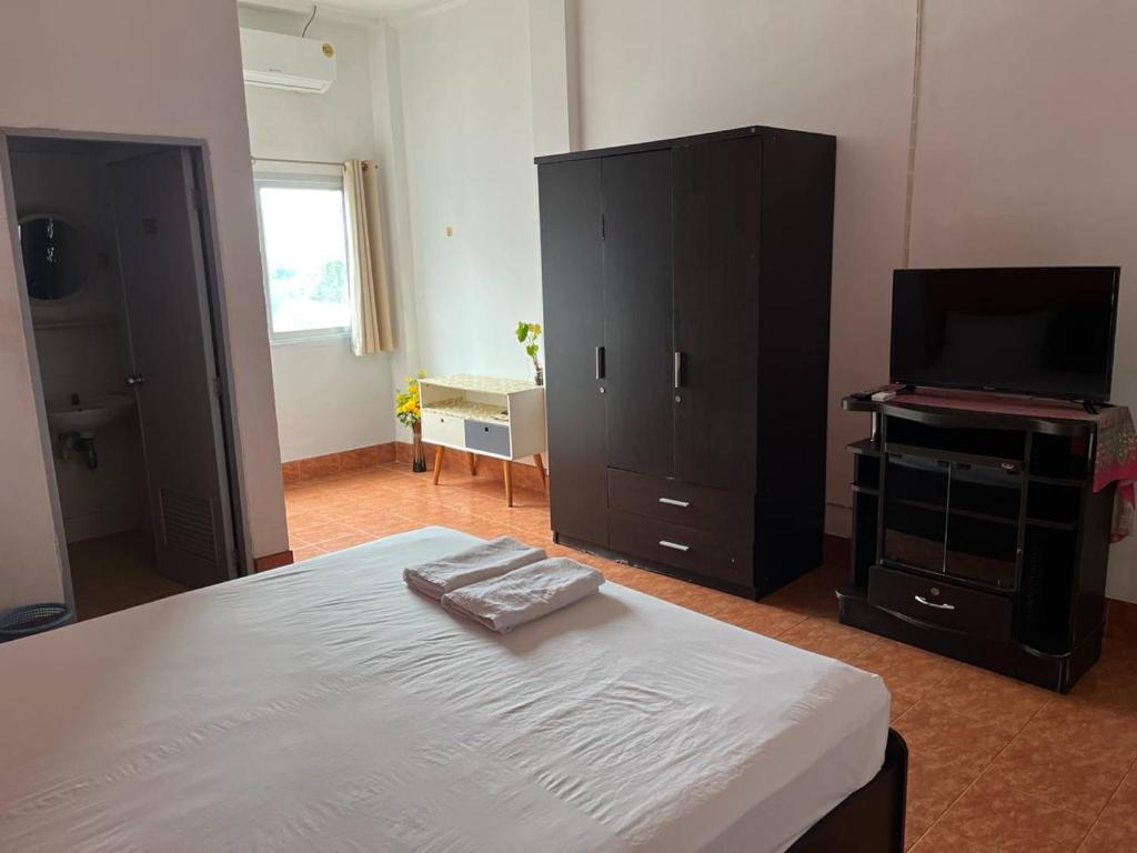 Postel nebo postele na pokoji v ubytování Lucky Banzaan
