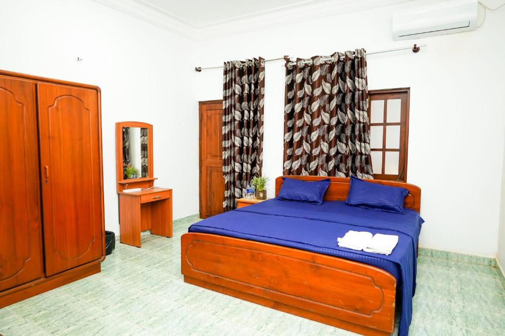 Postel nebo postele na pokoji v ubytování The Anam Hotel - Wellawatte
