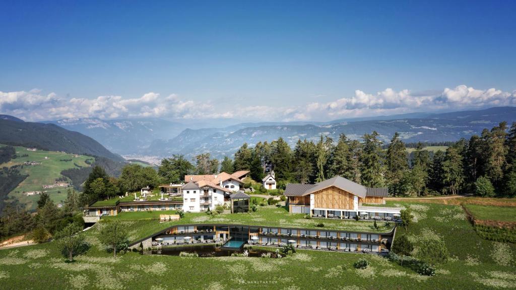 an aerial view of a house on a hill at Ansitz Velseck-Residence Hotel in Tires