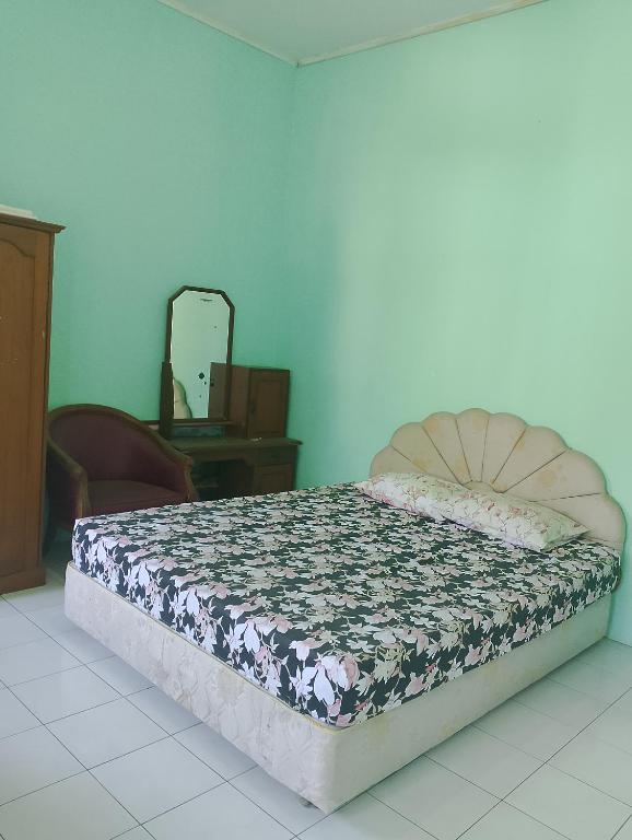 Postel nebo postele na pokoji v ubytování Kluwih House