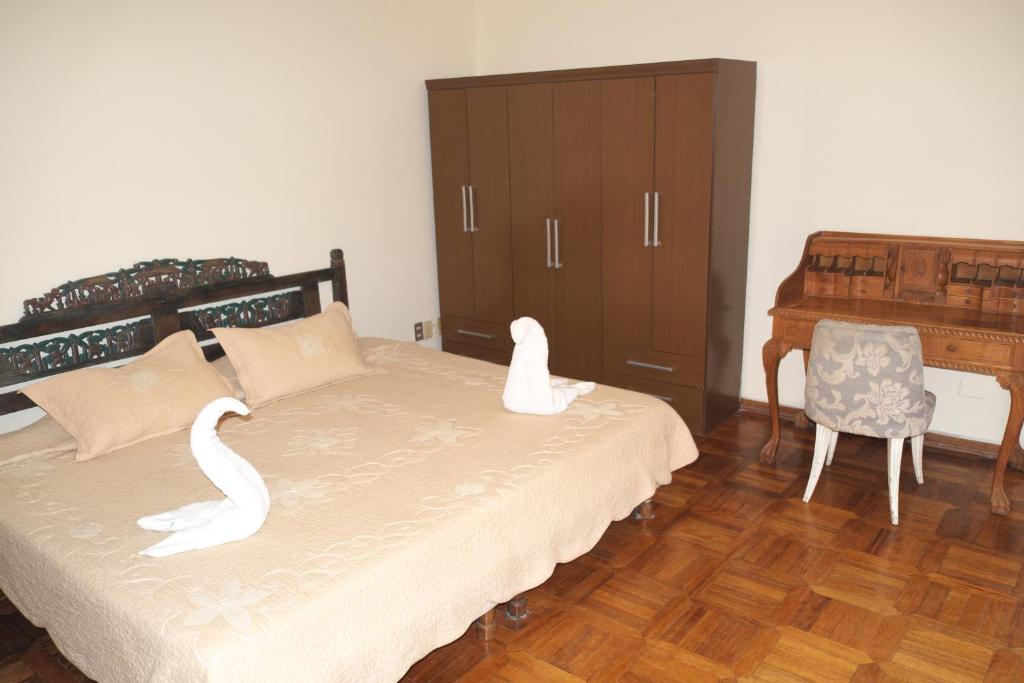 Rúm í herbergi á Inkawasi Miraflores Hostel