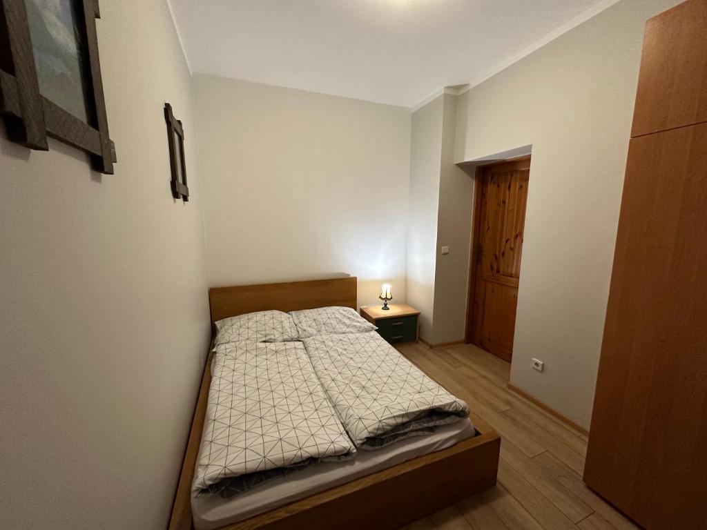 Posteľ alebo postele v izbe v ubytovaní Dom Gościnny Gerus