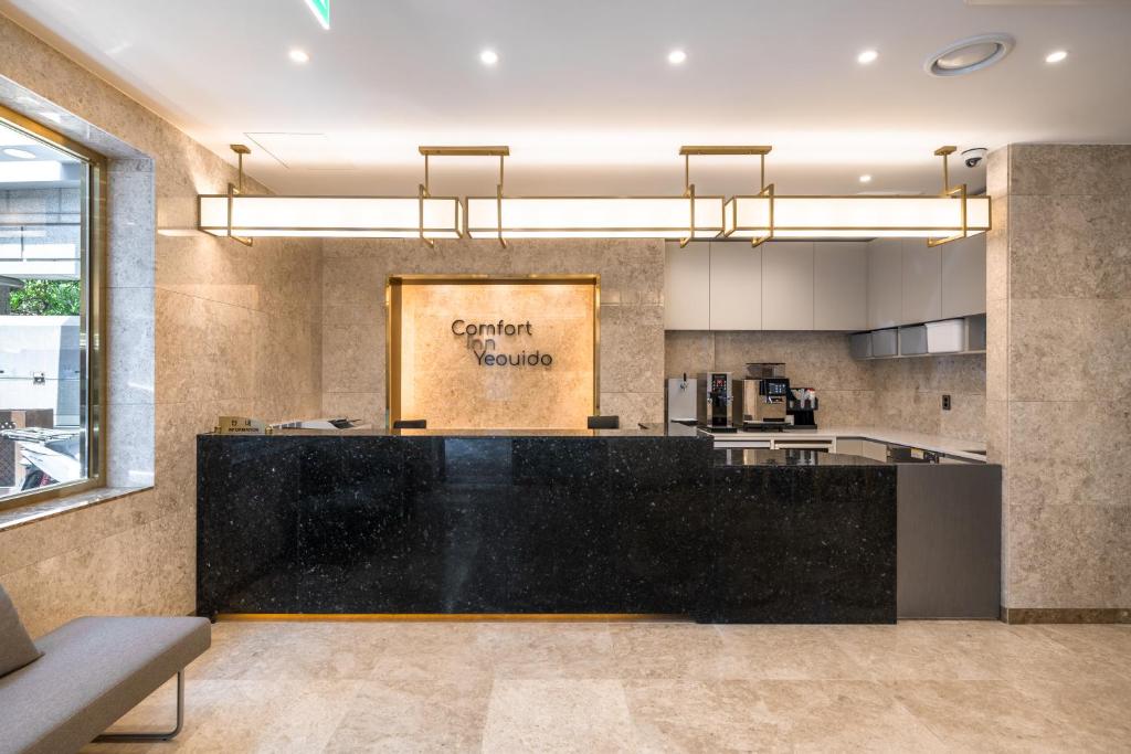 Kuchyň nebo kuchyňský kout v ubytování Comfort inn Yeouido