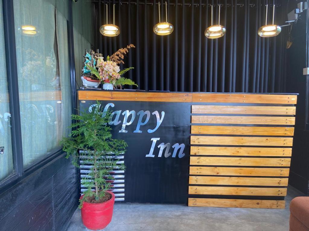 a happy line sign on the front of a store at happy trust happy inn in Nuwara Eliya