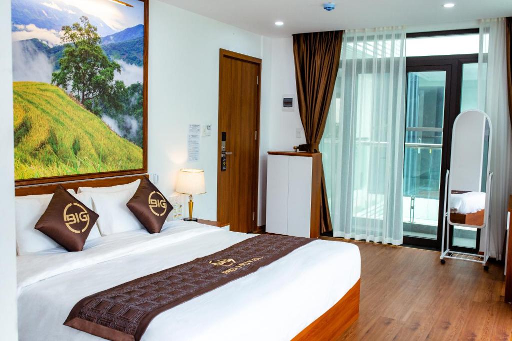 Postel nebo postele na pokoji v ubytování Big Hotel Lào Cai