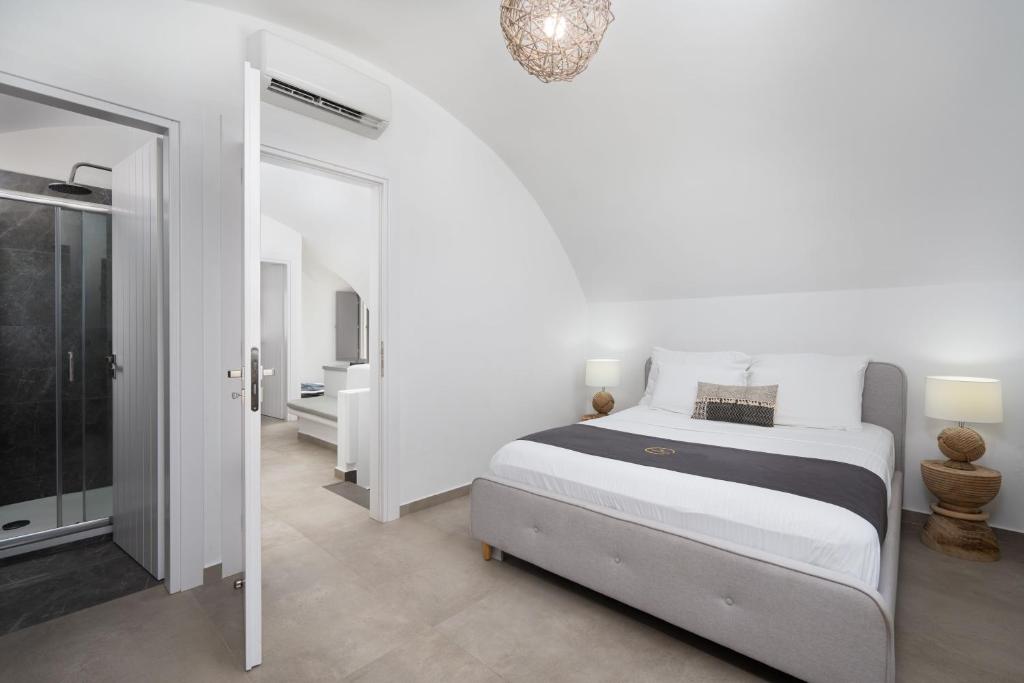 Postel nebo postele na pokoji v ubytování Aegean Melody Suites & Villas