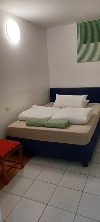 Postel nebo postele na pokoji v ubytování Como 3 B&B
