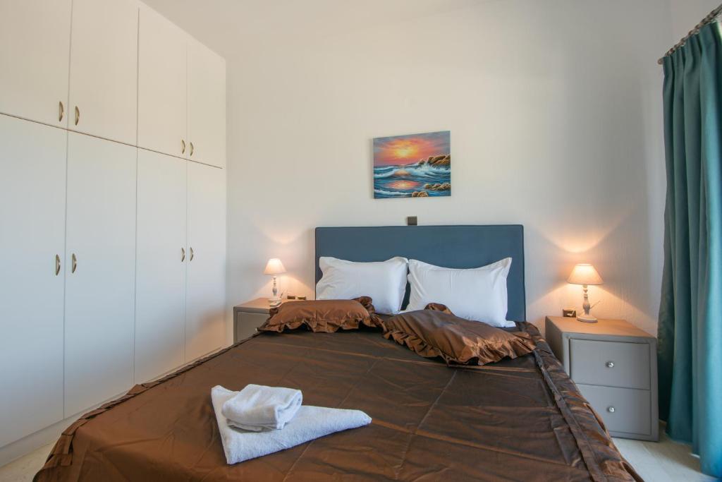 A bed or beds in a room at Istron MiraBella Villas