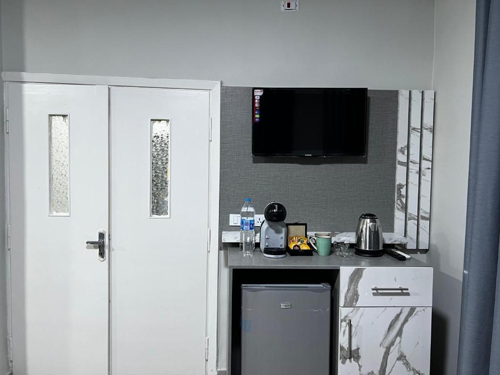 Kuchyň nebo kuchyňský kout v ubytování Downtown Inn Madaba
