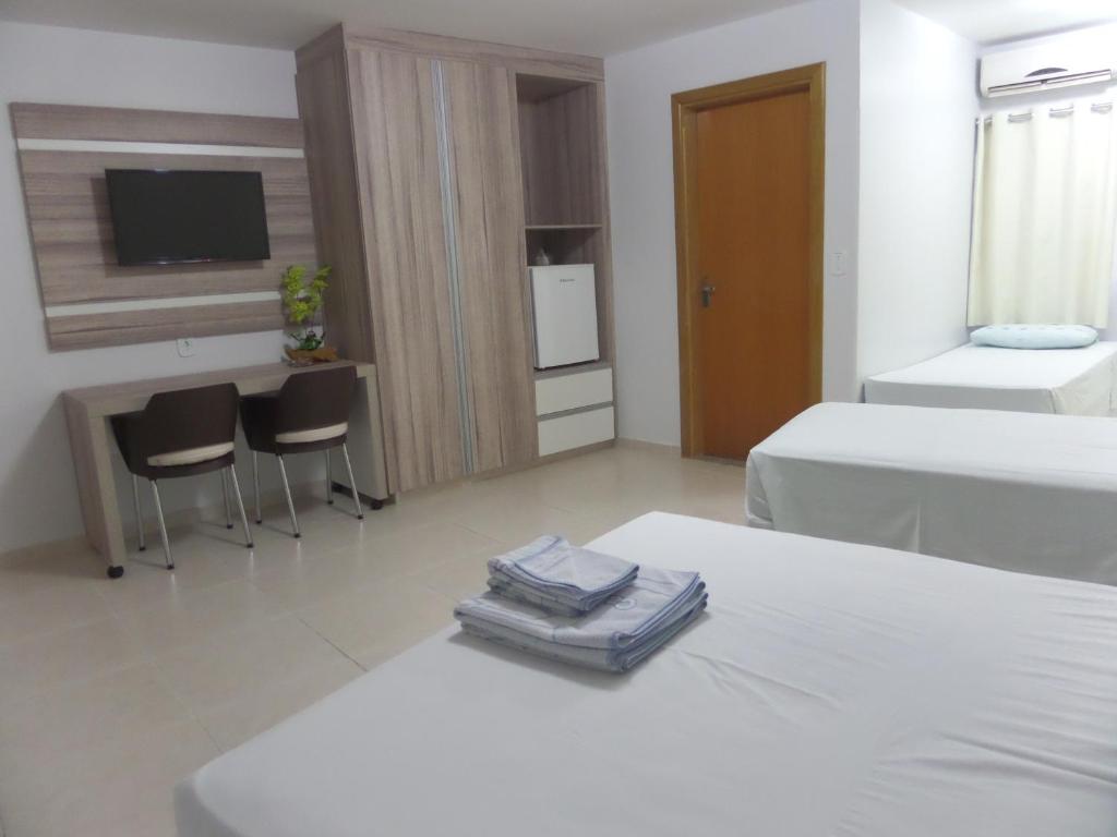 Cama ou camas em um quarto em Hotel CTC
