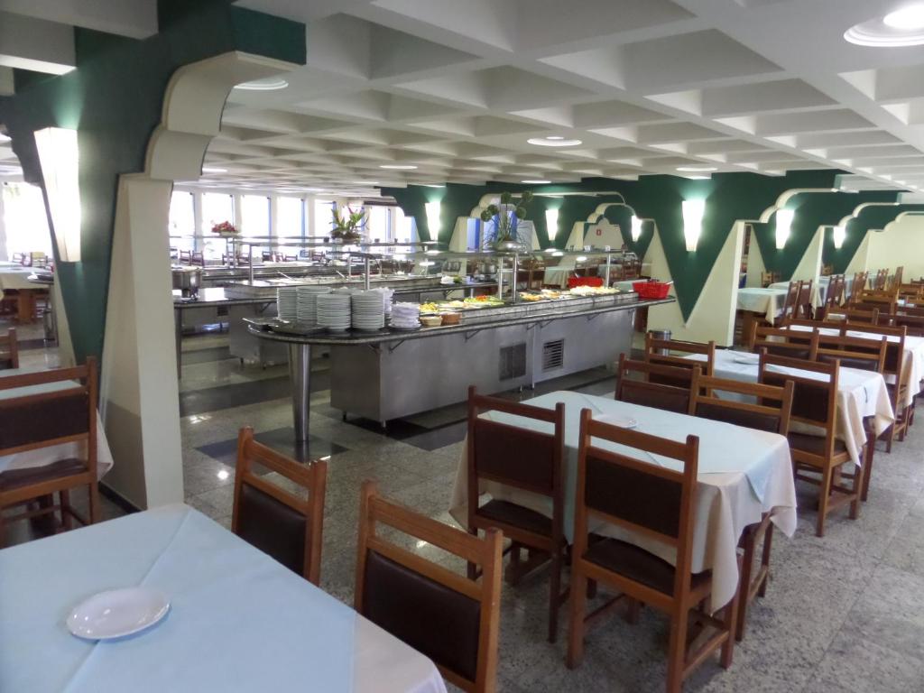 Um restaurante ou outro lugar para comer em Hotel CTC