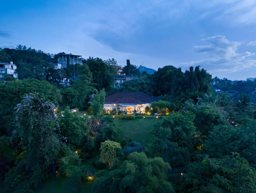 an aerial view of a house in the trees at Castle Hill Bungalow in Kandy