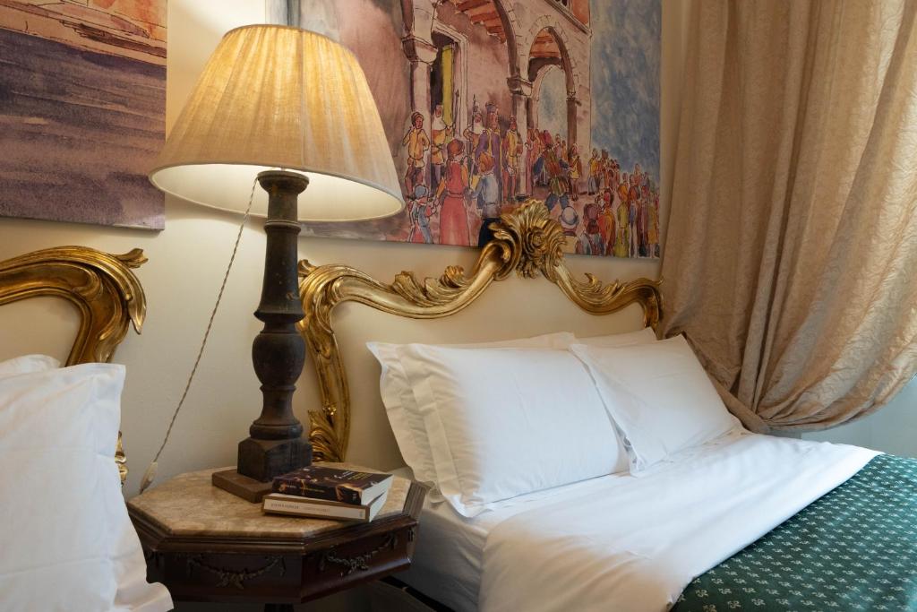 Postel nebo postele na pokoji v ubytování Morali Palace