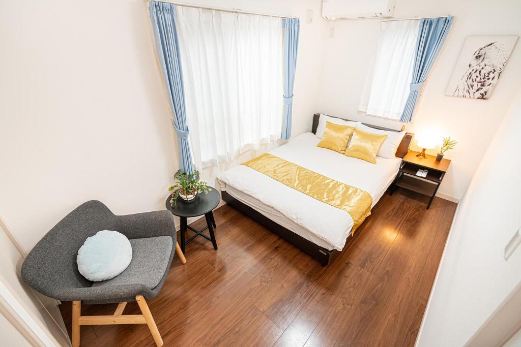 Postel nebo postele na pokoji v ubytování KYARA Hotel 浅草