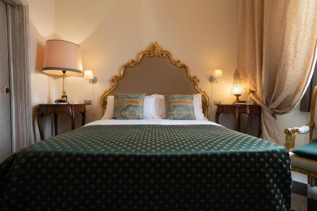 Postel nebo postele na pokoji v ubytování Morali Palace