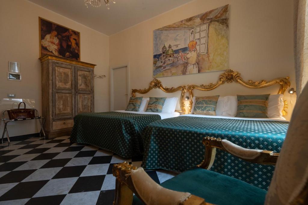 Postel nebo postele na pokoji v ubytování Morali Palace