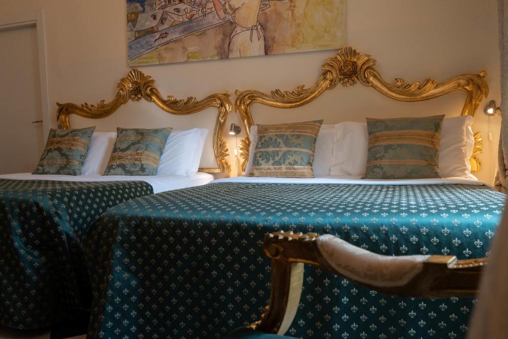 Postel nebo postele na pokoji v ubytování Morali Palace