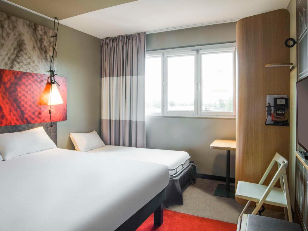 Postel nebo postele na pokoji v ubytování ibis Tarbes Odos